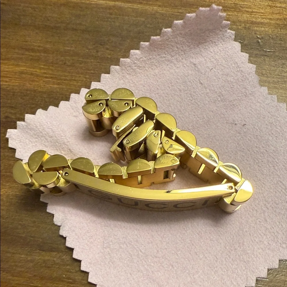 Gucci Gold Men's Bracelet with Black Lettering